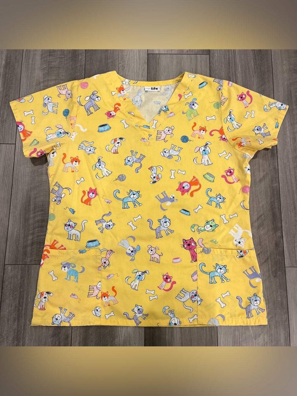 Women's Yellow Short-Sleeve Scrub Top with Playful Pets Print